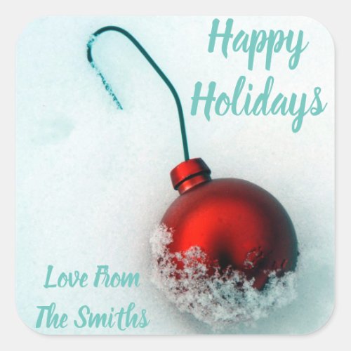 Cute festive red ornament on snow holiday photo square sticker