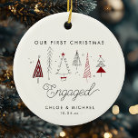 Cute First Christmas Engaged Whimsical Trees Ceramic Ornament<br><div class="desc">Celebrate your first Christmas engaged with this cute ornament! Featuring whimsical trees on a ceramic base,  it adds charm and joy to your holiday decor. Personalize with custom text for that extra-special touch</div>