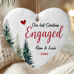 Cute first Christmas engagement red heart trees Ceramic Ornament<br><div class="desc">Celebrate your first Christmas engaged with this adorable heart shaped ceramic ornament featuring a bright red heart and cute Christmas trees. Its sweet hand drawn look and festive charm make it a perfect keepsake to mark this joyful moment. A lovely gift for newly engaged couples or a sentimental addition to...</div>