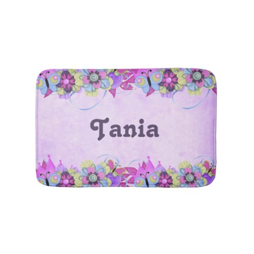 Cute flowers and butterflies on pink bath mat