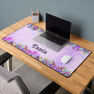 Cute flowers and butterflies on purple desk mat
