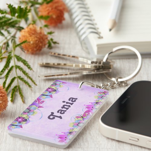 Cute flowers and butterflies on purple keychain