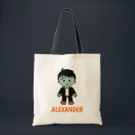 Cute Frankenstein Monster Halloween Trick or Treat Tote Bag<br><div class="desc">The design features a cute Frankenstein zombie cartoon monster and a custom name.</div>