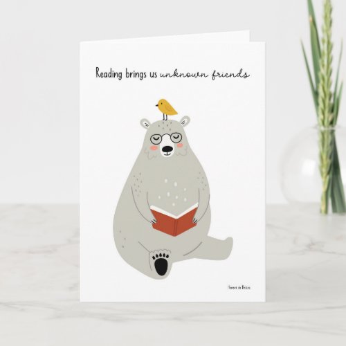 Cute friendly bear with bird reading a book card