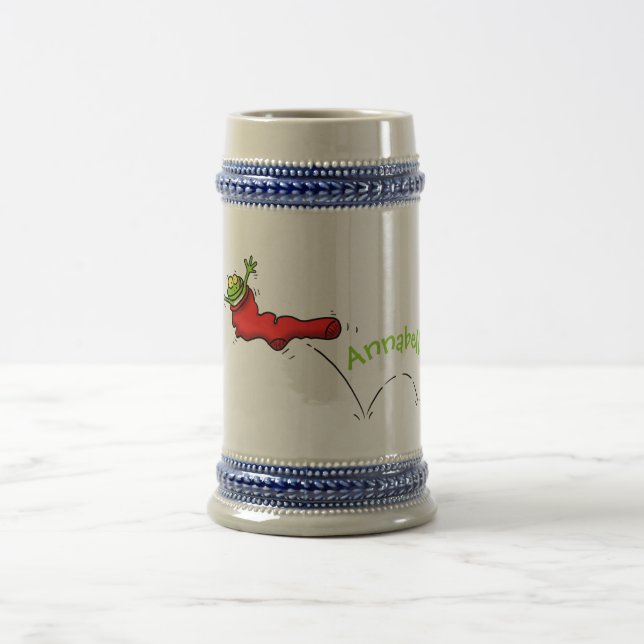 Cute frog in a red sock jumping cartoon beer stein (Center)