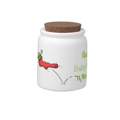 Cute frog in a red sock jumping cartoon candy jar
