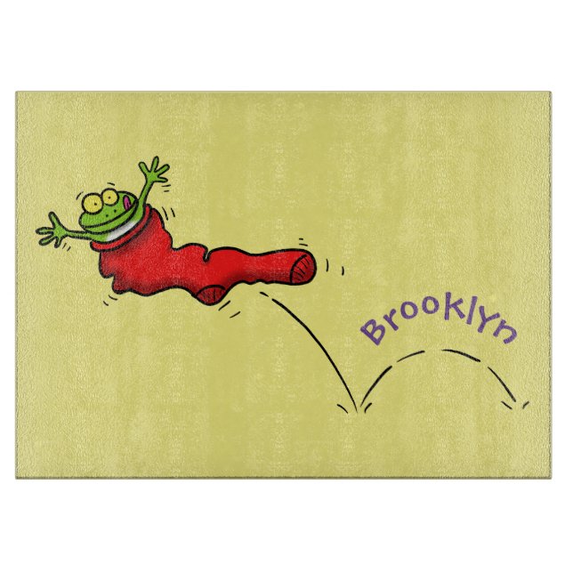 Cute frog in a red sock jumping cartoon cutting board (Front)