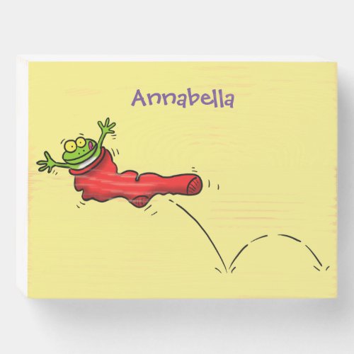 Cute frog in a red sock jumping cartoon wooden box sign
