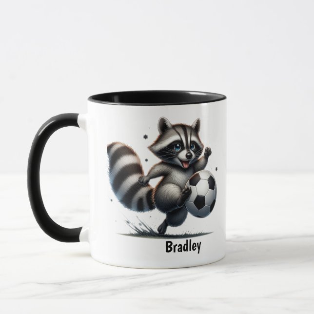 Cute Fun Animal Humor Raccoon Playing Soccer Mug (Left)