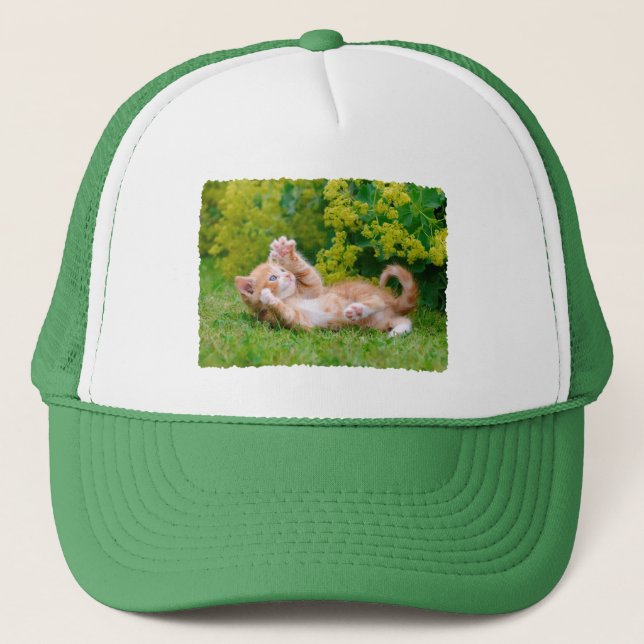 Cute funny cat kitten playing in a flowery garden trucker hat (Front)