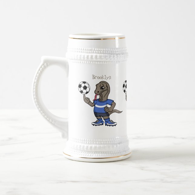 Cute funny Komodo dragon playing soccer cartoon Beer Stein (Left)