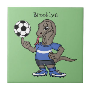 Cute funny Komodo dragon playing soccer cartoon Ceramic Tile
