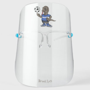 Cute funny Komodo dragon playing soccer cartoon Face Shield