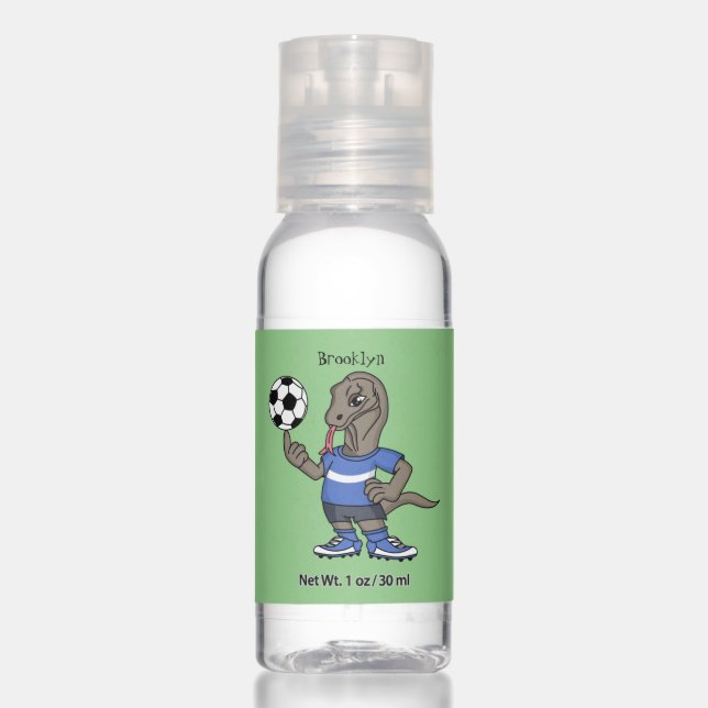 Cute funny Komodo dragon playing soccer cartoon Hand Sanitizer (Front)