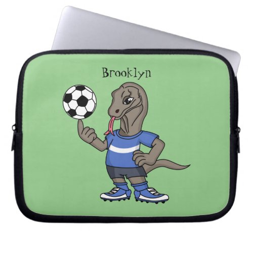 Cute funny Komodo dragon playing soccer cartoon Laptop Sleeve