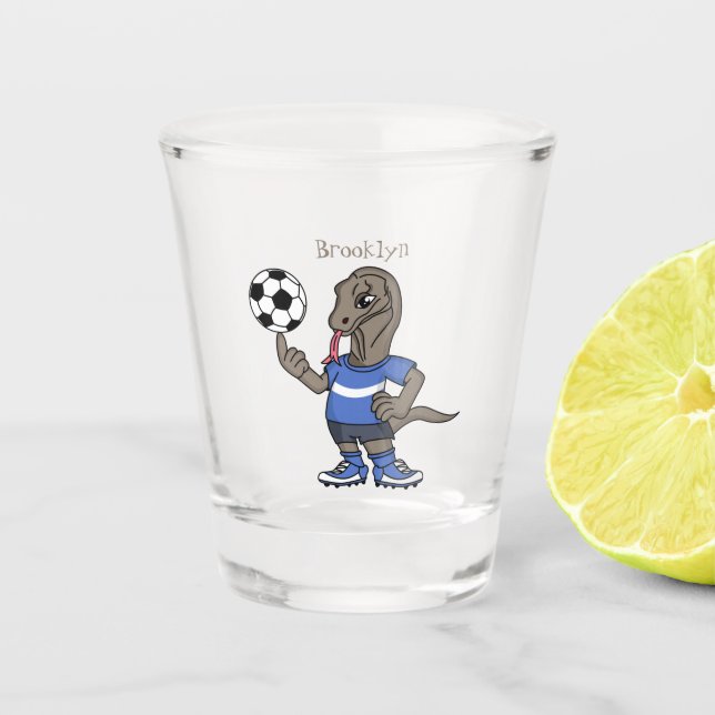 Cute funny Komodo dragon playing soccer cartoon Shot Glass (Front)