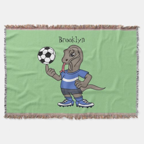 Cute funny Komodo dragon playing soccer cartoon Throw Blanket