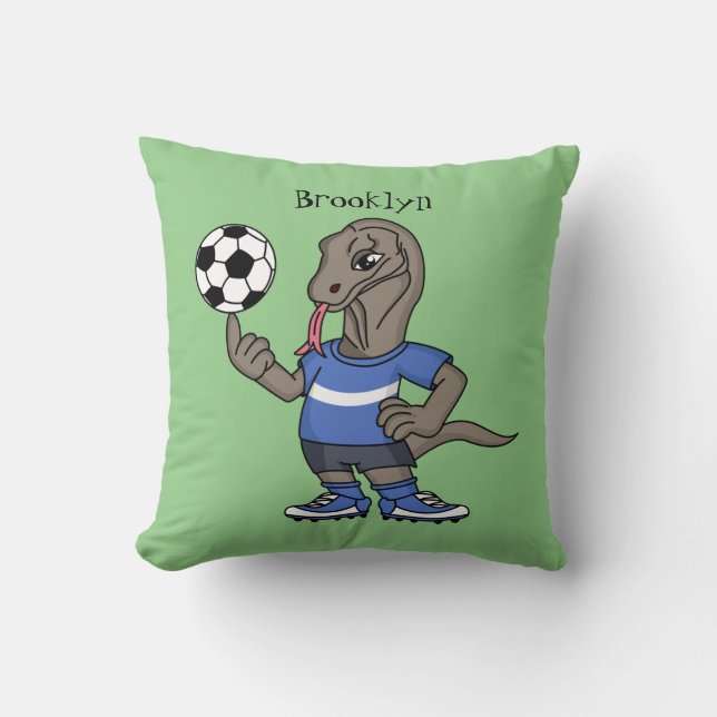 Cute funny Komodo dragon playing soccer cartoon Throw Pillow (Front)