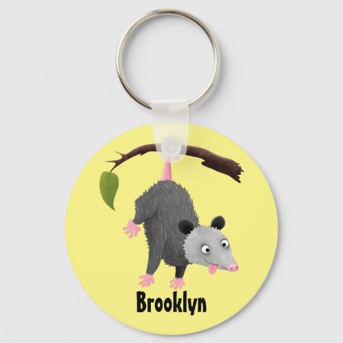 Cute funny opossum hanging from branch cartoon keychain