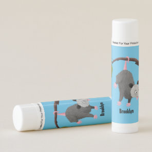 Cute funny opossum hanging from branch cartoon lip balm