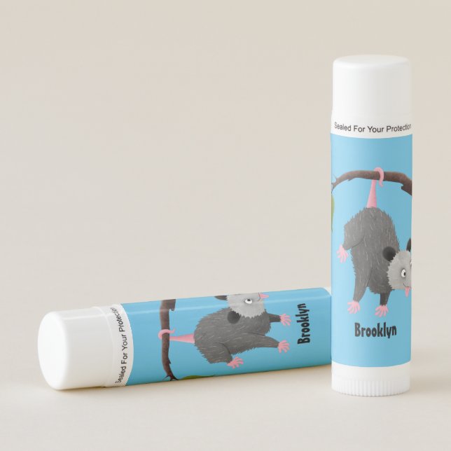 Cute funny opossum hanging from branch cartoon lip balm (Front)