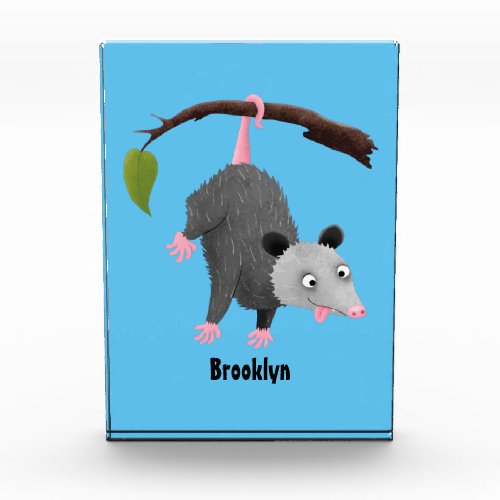 Cute funny opossum hanging from branch cartoon photo block