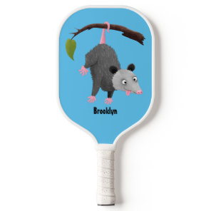 Cute funny opossum hanging from branch cartoon pickleball paddle