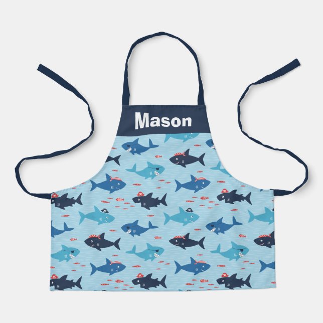Cute funny sharks with pirate hats on blue apron (Front)
