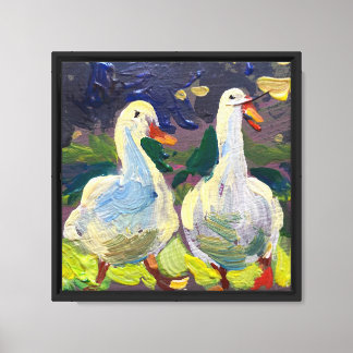 cute geese against a background of grass canvas print