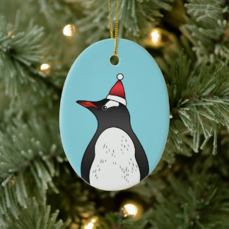 Cute Gentoo Penguin Wearing A Santa Hat On Blue Ceramic Ornament