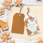 Cute Gingerbread Man Baby Shower Thank You Gift Tags<br><div class="desc">Add a touch of sweetness to your baby shower favors with our charming gift tag. Featuring "Thank you" in graceful script,  it is accompanied by a whimsical watercolor gingerbread man,  snowflakes,  and festive elements on a pastel blue background. Perfect for your Christmas or winter baby shower favors.</div>
