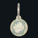 Cute Girly Pet Name and Contact Information Floral Pet ID Tag<br><div class="desc">Super girly pet ID tag featuring a violets floral frame with pet name in the front. In addition there are several lines of custom text for your to personalize with a phone number, email address and other contact info on the back. Classy tag for your lovely cat or dog girl....</div>