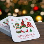 Cute Gnomes Merry Christmas Square Paper Coaster<br><div class="desc">Cute personalized coasters for your Christmas holiday tableware or Christmas party featuring three Scandinavian-style gnomes with a seasonal red and green hats and snowflakes and "Merry Christmas" and your name in red typography.</div>