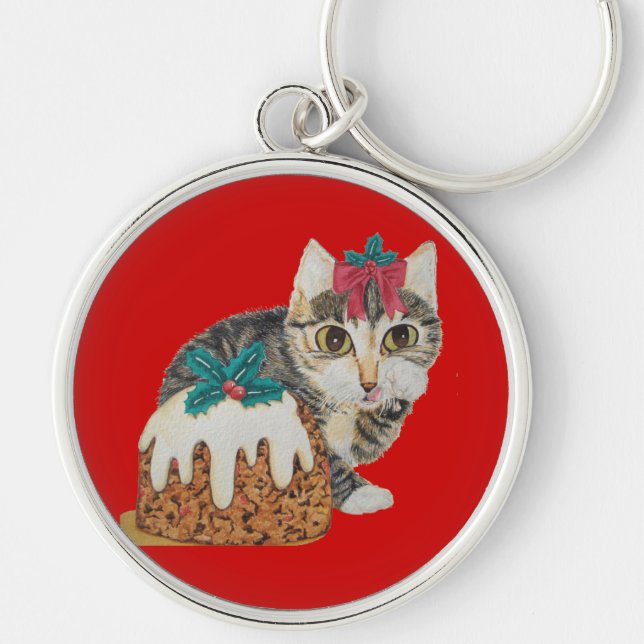 cute gray kitten licking paw at christmas keychain (Front)