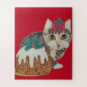 cute gray tabby kitten licking paw for christmas jigsaw puzzle