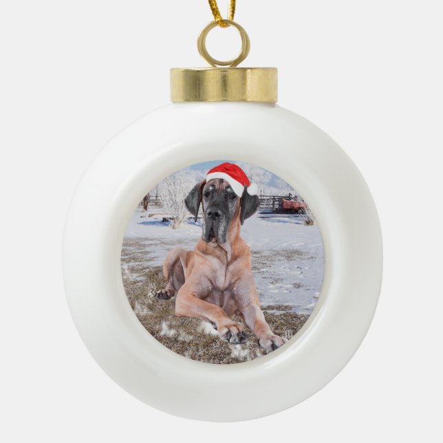 Cute Great Dane Dog Sitting In Snow Christmas Hat Ceramic Ball Christmas Ornament (Front)