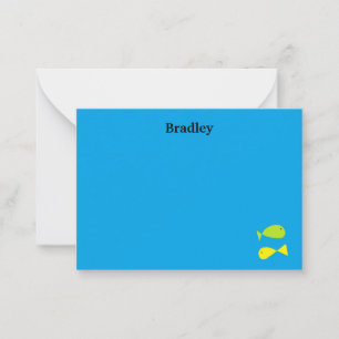 Cute green and yellow fishes on blue note card