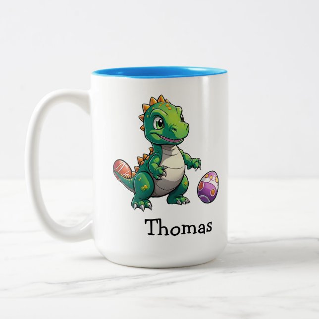 Cute green dinosaur with Easter eggs Two-Tone Coffee Mug (Left)