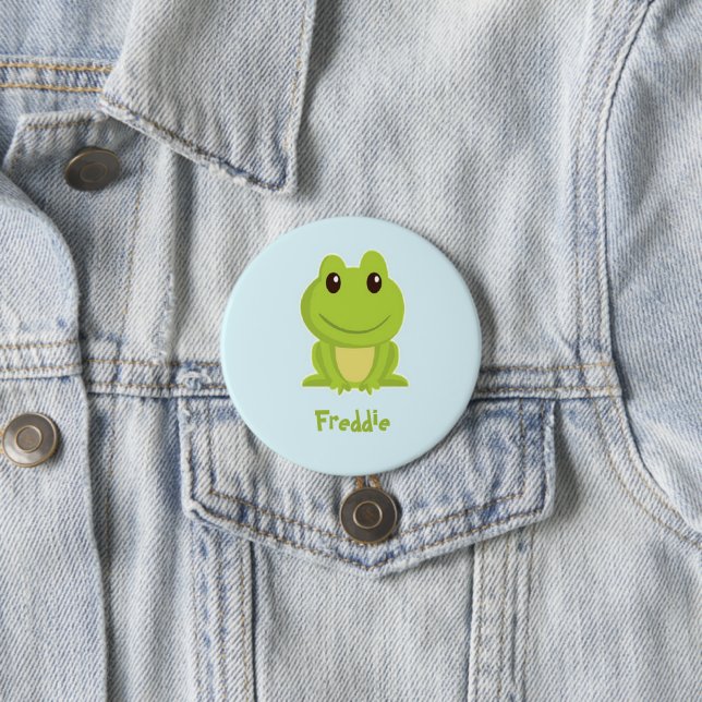 Cute green frog on blue  button (In Situ)