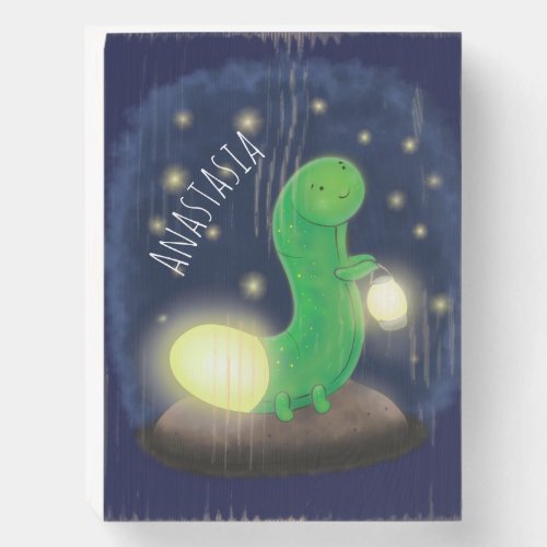 Cute green glow worm cartoon illustration wooden box sign