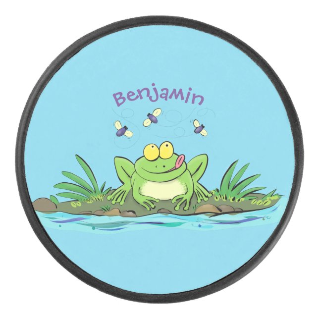 Cute green hungry frog cartoon illustration hockey puck (Front)
