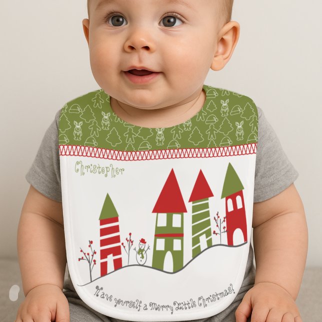 Cute green&red village in the snow at Christmas Baby Bib (In situ - AI generated not areal view)