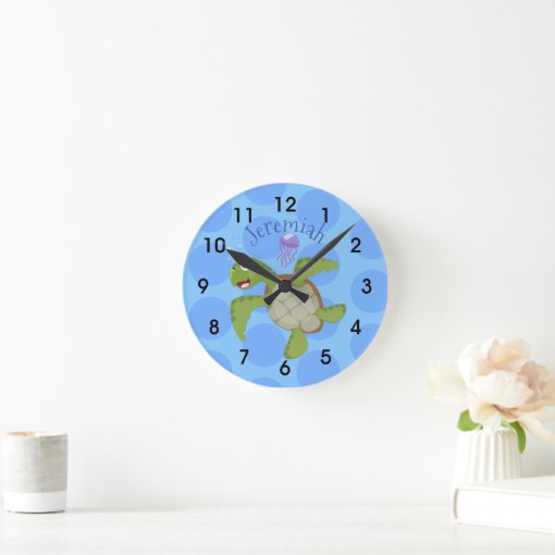 Cute green sea turtle happy cartoon illustration round clock | Zazzle