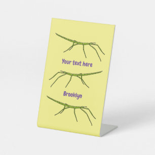 Cute green stick insects with happy faces cartoon pedestal sign