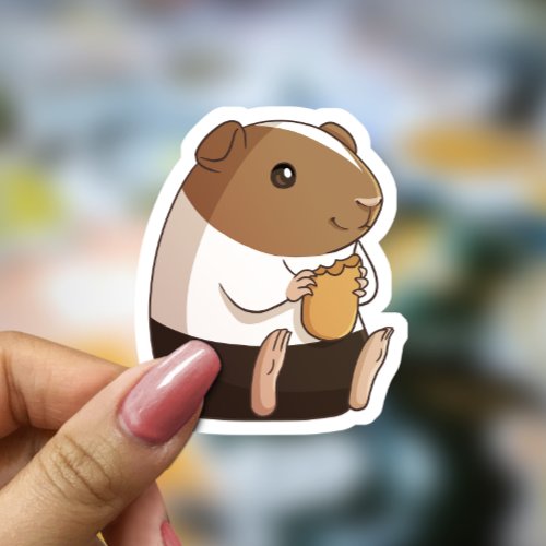 Cute Guinea Pig Snacking on a Baby Carrot Sticker