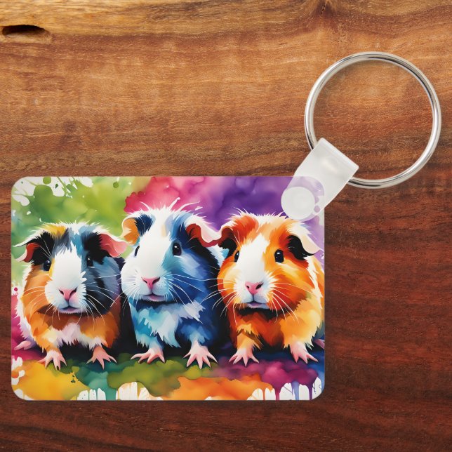 Cute guinea pigs with splashes of color, custom keychain (Front)