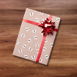Cute hand drawn butterfly pattern on pink wrapping paper