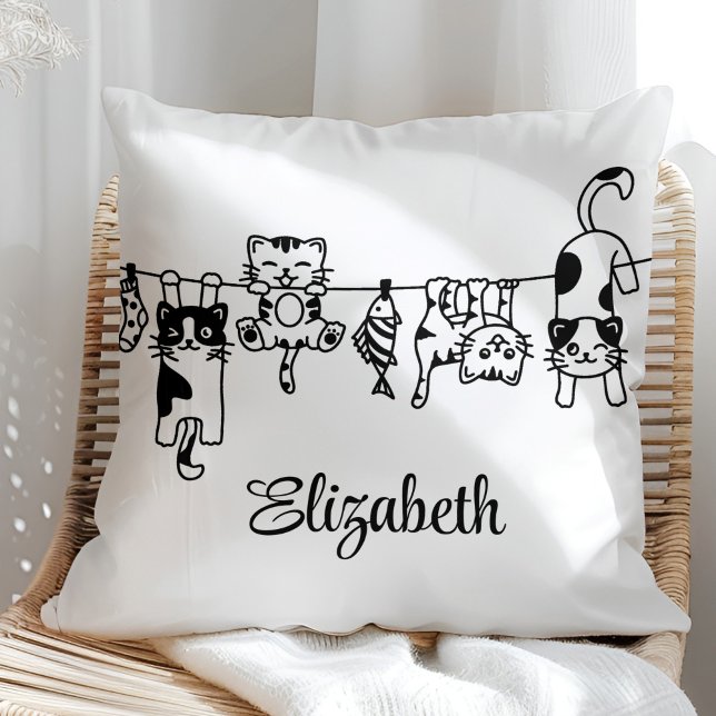 Cute Hanging Kittens Custom Name Throw Pillow (Cute Hanging Kittens Custom Name Throw Pillow in a sunny boho neutral rattan chair.)