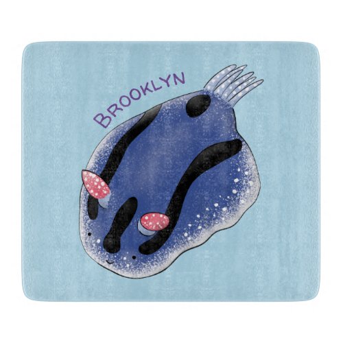 Cute happy blue nudibranch cartoon illustration cutting board