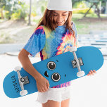 Cute Happy Cartoon Face Custom Personalized Name Skateboard<br><div class="desc">Cute Happy Cartoon Face Custom Personalized Name Skateboard features your personalized name in modern typography on a simple blue background with a cute smiling cartoon face. Personalize by editing the text in the text box provided. Give a custom made gift, personalized skateboard to your favorite skateboarder for Christmas, birthday or...</div>